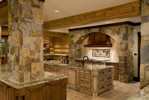 Custom granite kitchen in cabin style home